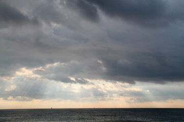 Storm weather on the sea. Dramatic view. grey clouds over the sea.