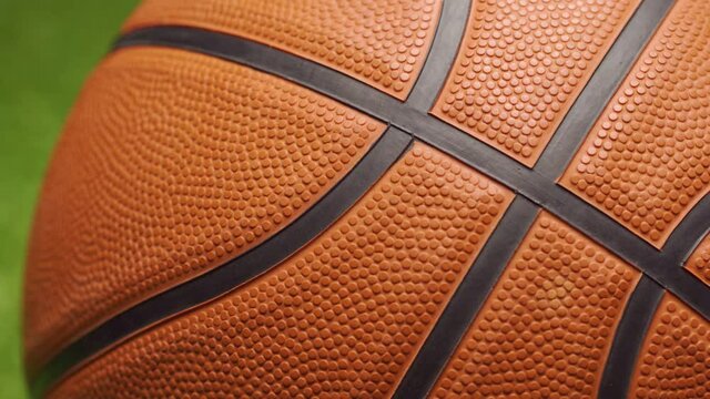 Basketball ball close up on dark black background