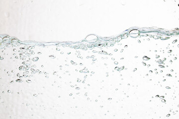 Closeup bubbles underwater on white background.
