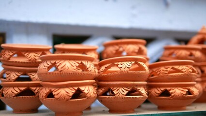 Traditional clay pot, Thai earthenware handmade, beautiful carving pottery display in market