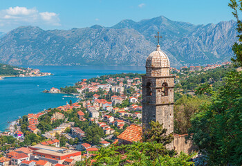 Kotor city from above, ancient Church Our Lady of Remedy on the hill, colorful cityscape in Montenegro