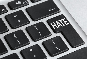 Button with text Hate on computer keyboard, closeup