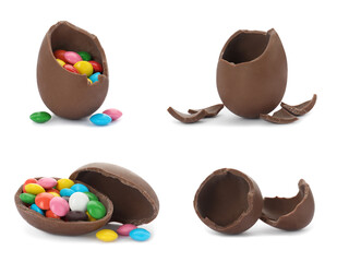 Set with broken chocolate eggs on white background