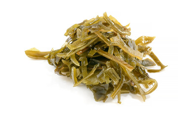 Sea kale. Seaweed kelp , on a white isolated background, close-up, selective focus. Laminari.