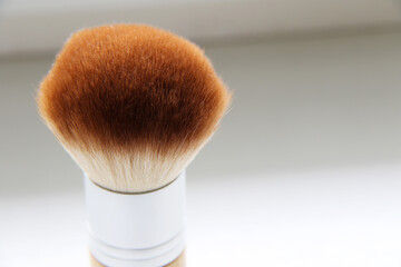 natural brown make up brush close up