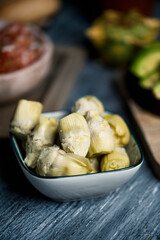 cooked artichoke hearts in a bowl