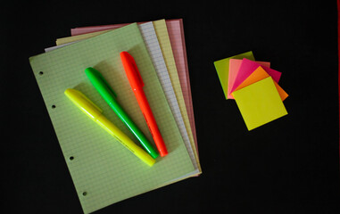 colored markers on colored checkered sheets and stickers