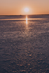 Fototapeta premium Beautiful sunset over the salty pink lake