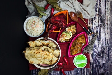 Traditional Indian food chicken tandoori and Tikka with garlic naan