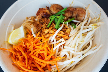 Delicious homemade Vietnamese soup Pho cooked with rice noodles, coriander leaves, soy sprouts, onions and chicken pieces for a complete and healthy meal