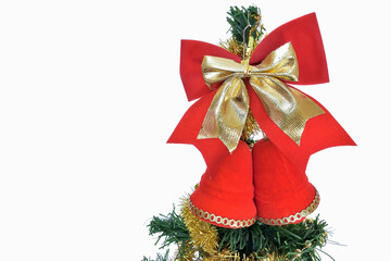 Christmas ornaments with red bells and golden ribbon