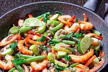 Mediterranean salad with shrimps and tahini sauce