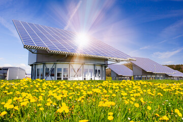 renewable energy with sun panels on roof of an building