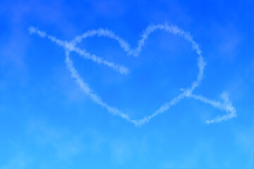 Heart with arrow made from clouds on sky. Valentines day and love concept. 