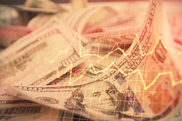Double exposure of forex graph drawing over us dollars bill background. Concept of financial markets.