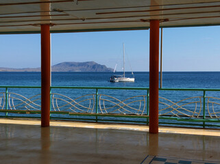 Fototapeta na wymiar Yacht in the bay off the Black Sea coast of the Crimean peninsula.
