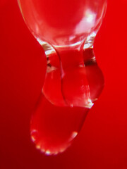 Close up of pipette and drop of liquid