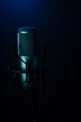 Professional blue studio microphone on black