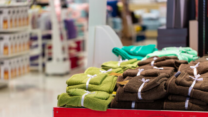 multicolored towels on the shelves