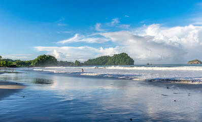 Manuel Antonio beatiful tropical beach with white sand and blue ocean. Paradise. National Park in Costa Rica, Central America.