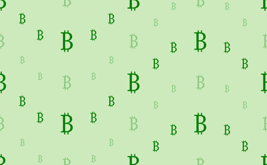 Seamless pattern of large and small green bitcoin symbols. The elements are arranged in a wavy. Vector illustration on light green background