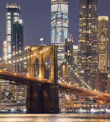 Fototapety  Brooklyn Bridge nocą, kolorowy obraz, Nowy Jork, USA.
