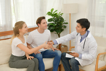 Fototapeta premium Love couple having infertility problems need advisor with the doctor.