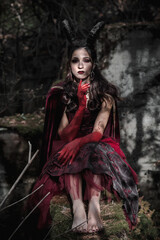 Dark fairy in the forest