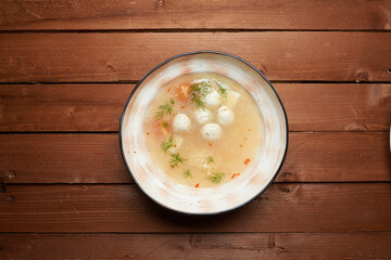 soup with meatballs on the plate