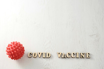 Vaccination concept. Medical instrument on a light background. Coronavirus vaccine vial and syringes