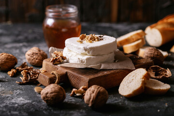 Goat cheese served with honey and walnuts