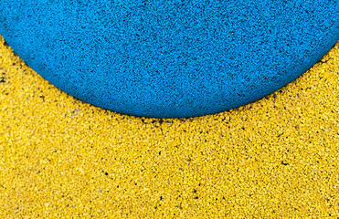 Outdoor running area. Rubber floorings. Rubber surface. Colored athletics field. Texture...