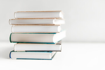 stack of books on white background