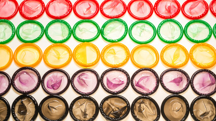 Colorful condoms background.