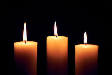 close up flame candles on black background      