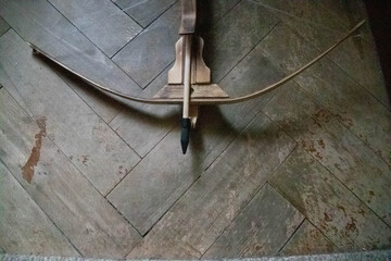 Beautiful vintage crossbow and arrow top view