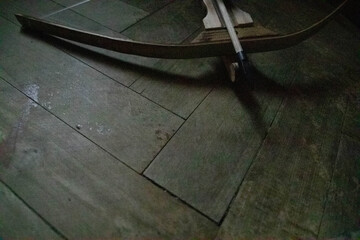 Close up of arrow and crossbow with copy space