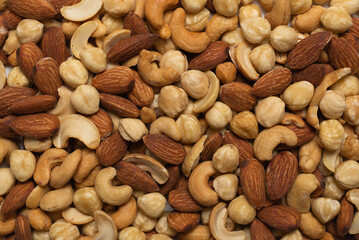 Mix of nuts isolated on white background. Top view.
