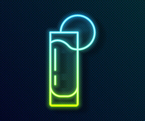 Glowing neon line Tequila glass with lemon icon isolated on black background. Mexican alcohol drink. Vector.