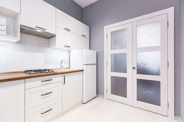 Fototapeta na wymiar interior photography, kitchen studio in modern loft style in bright colors with furniture