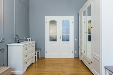 Photo of the interior of the bedroom, a large bed, in white, in a modern style