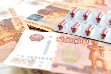 Russian money and pills, the concept of increasing the cost of medicines and vaccines