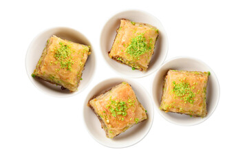 Pistachio baklava on a white background. Dessert.