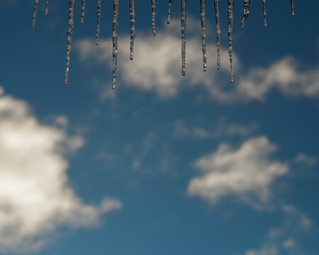 Icicles against a blue sky