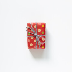 Dot pattern red gift box isolated on white background. top view, copy space