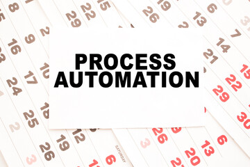 text PROCESS AUTOMATION on a sheet from Notepad.a digital background. business concept . business and Finance.