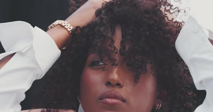 Attractive Black Woman Raising Her Hair While A Friend Fixes Her Shirt