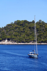 Sailing boat near island Lastovo, Croatia. Beautiful Mediterranean landscape.