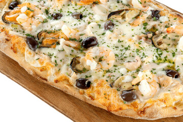 Homemade pintsa, garnished with olives, cheese and mussels.