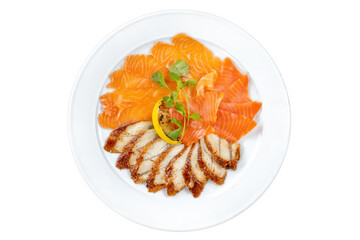 Salmon and eel, sliced on a white plate, with lemon. Decorated with parsley.